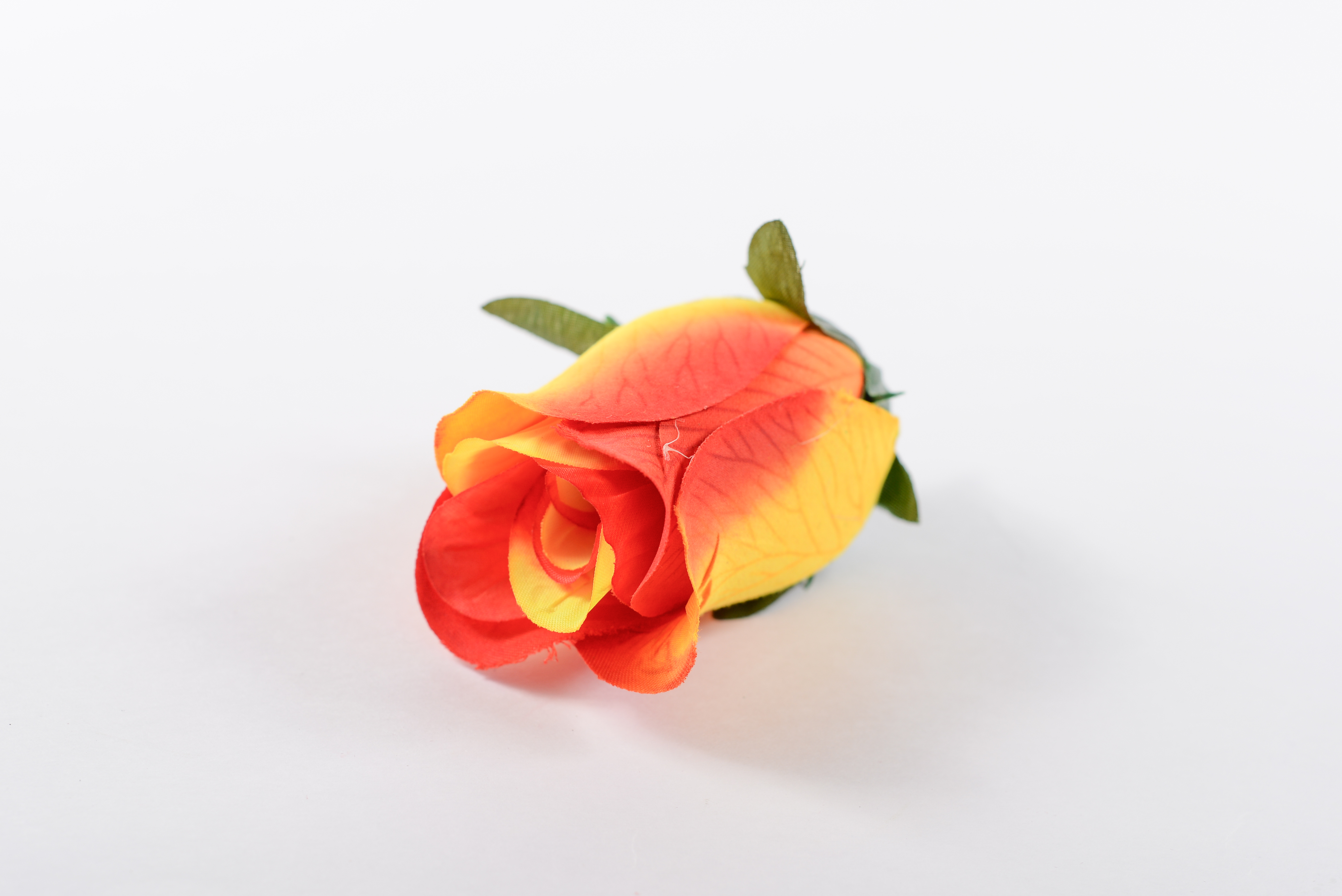 Роза бутон мраморная 5 сл h=10см 1/20  к/сб оранжевый
